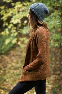 Gorgeous, fingering weight long cardigan with pockets and honeycomb detailing on the back panel.  